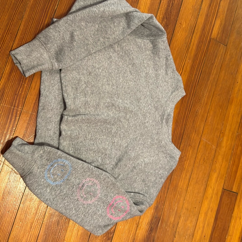 Vintage Havana  barely worn  smiley faces on the left sleeve Size medium 10/12